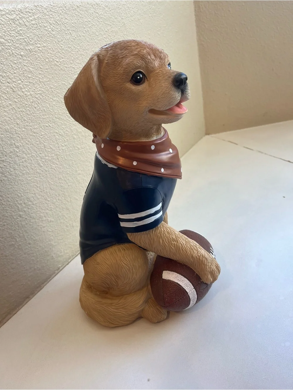 Brown Labrador Dog Figurine holding Football and Wearing a #1 Jersey